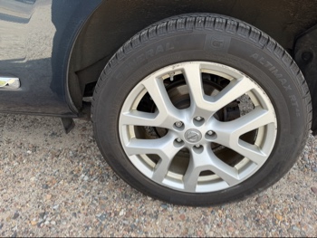 2013 nissan rogue s-awd with 108328 miles for sale near elk-river, minnesota 106488_13_rear_drv_wheel.jpg