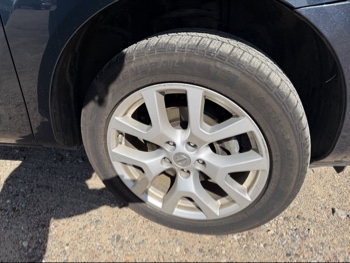2013 nissan rogue s-awd with 108328 miles for sale near elk-river, minnesota 106488_15_front_pass_wheel.jpg