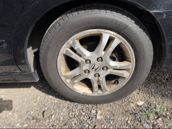 2007 honda accord ex-l-sedan-at with 166984 miles for sale near elk-river, minnesota 106492_13_rear_drv_wheel.jpg
