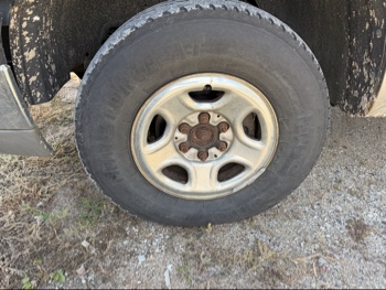2003 chevrolet silverado-1500 ext.-cab-short-bed-4wd with 150423 miles for sale near elk-river, minnesota 106493_12_drv_front_wheel.jpg