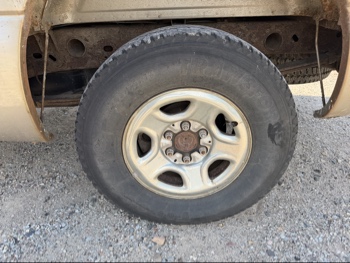 2003 chevrolet silverado-1500 ext.-cab-short-bed-4wd with 150423 miles for sale near elk-river, minnesota 106493_13_rear_drv_wheel.jpg