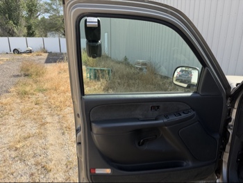 2003 chevrolet silverado-1500 ext.-cab-short-bed-4wd with 150423 miles for sale near elk-river, minnesota 106493_23_driver_door_panel.jpg
