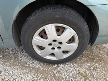 2007 toyota corolla with 80829 miles for sale near elk-river, minnesota 106497_15_front_pass_wheel.jpg