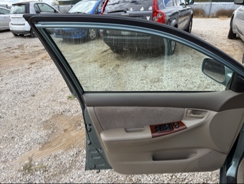 2007 toyota corolla with 80829 miles for sale near elk-river, minnesota 106497_23_driver_door_panel.jpg