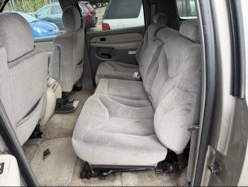 2002 gmc yukon-xl 1500-4wd with 148627 miles for sale near elk-river, minnesota 106511_24_drv_rear_seat.jpg