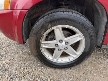 2006 chevrolet equinox lt-awd with 221047 miles for sale near elk-river, minnesota 106525_12_drv_front_wheel.jpg