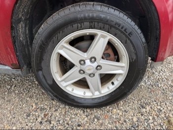 2006 chevrolet equinox lt-awd with 221047 miles for sale near elk-river, minnesota 106525_15_front_pass_wheel.jpg