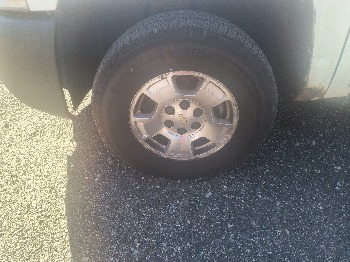 2011 chevrolet silverado-1500 work-truck-4wd with 252641 miles for sale near elk-river, minnesota 106527_12_drv_front_wheel.jpg