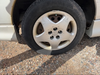 2003 toyota corolla ce with 248006 miles for sale near elk-river, minnesota 106529_14_rear_pass_wheel.jpg