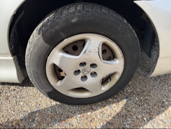 2003 toyota corolla ce with 248006 miles for sale near elk-river, minnesota 106529_15_front_pass_wheel.jpg