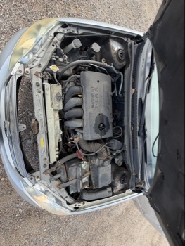 2003 toyota corolla ce with 248006 miles for sale near elk-river, minnesota 106529_49_engine_bay.jpg
