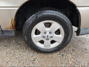 2004 ford freestar lx-sport with 163395 miles for sale near elk-river, minnesota 106532_13_rear_drv_wheel.jpg