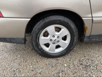 2004 ford freestar lx-sport with 163395 miles for sale near elk-river, minnesota 106532_14_rear_pass_wheel.jpg