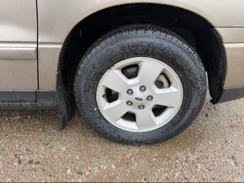 2004 ford freestar lx-sport with 163395 miles for sale near elk-river, minnesota 106532_15_front_pass_wheel.jpg