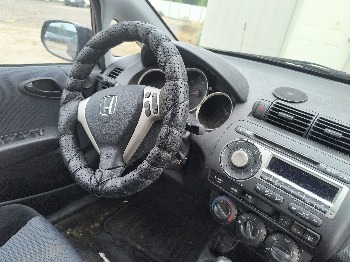 2008 honda fit sport-5-speed-at with 58667 miles for sale near elk-river, minnesota 106540_36_steering_wheel.jpg
