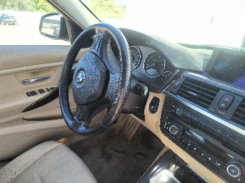 2013 bmw 3-series 328i-xdrive-sedan with 309815 miles for sale near elk-river, minnesota 106543_36_steering_wheel.jpg