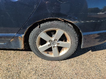 2006 honda civic ex-sedan-at with 168786 miles for sale near elk-river, minnesota 106550_13_rear_drv_wheel.jpg