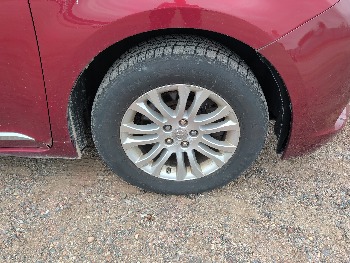 2011 toyota sienna limited-7-pass-v6 with 217246 miles for sale near elk-river, minnesota 106553_15_front_pass_wheel.jpg