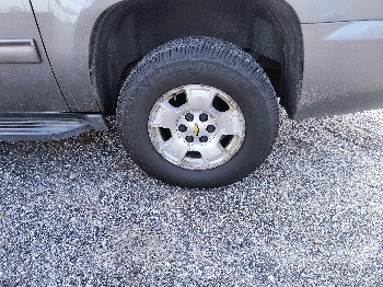2013 chevrolet suburban ltz-1500-4wd with 215158 miles for sale near elk-river, minnesota 106563_13_rear_drv_wheel.jpg
