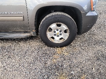 2013 chevrolet suburban ltz-1500-4wd with 215158 miles for sale near elk-river, minnesota 106563_15_front_pass_wheel.jpg