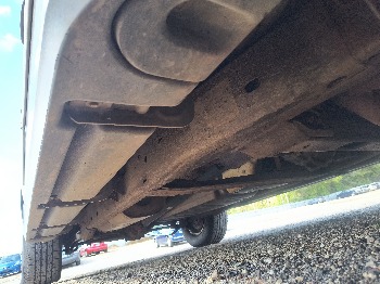 2013 chevrolet suburban ltz-1500-4wd with 215158 miles for sale near elk-river, minnesota 106563_21_undercar_pass_side.jpg