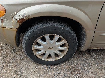 2003 chrysler town-and-country with 184015 miles for sale near elk-river, minnesota 106565_12_drv_front_wheel.jpg