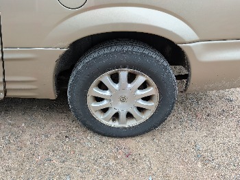 2003 chrysler town-and-country with 184015 miles for sale near elk-river, minnesota 106565_13_rear_drv_wheel.jpg