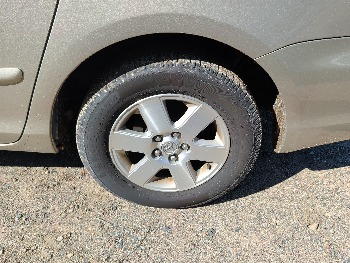 2006 toyota sienna le-7-passenger with 274406 miles for sale near elk-river, minnesota 106567_13_rear_drv_wheel.jpg