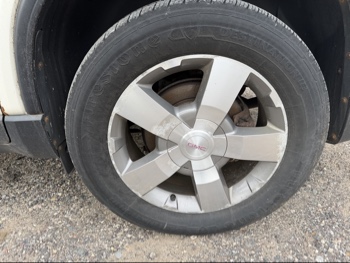 2012 gmc acadia slt-1-awd with 221954 miles for sale near elk-river, minnesota 106571_13_rear_drv_wheel.jpg