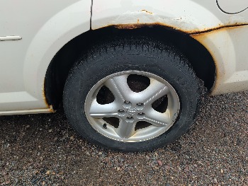 2005 dodge stratus with 83806 miles for sale near Elk River, Minnesota 106577_13_rear_drv_wheel.jpg
