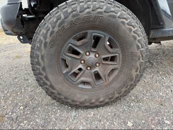 2016 jeep wrangler unlimited-sahara-4wd with 91724 miles for sale near Elk River, Minnesota 106578_12_drv_front_wheel.jpg