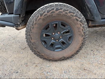 2016 jeep wrangler unlimited-sahara-4wd with 91724 miles for sale near Elk River, Minnesota 106578_14_rear_pass_wheel.jpg