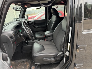 2016 jeep wrangler unlimited-sahara-4wd with 91724 miles for sale near Elk River, Minnesota 106578_22_driver_seat.jpg