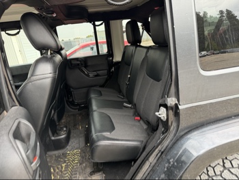2016 jeep wrangler unlimited-sahara-4wd with 91724 miles for sale near Elk River, Minnesota 106578_24_drv_rear_seat.jpg