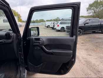 2016 jeep wrangler unlimited-sahara-4wd with 91724 miles for sale near Elk River, Minnesota 106578_32_passenger_door_panel.jpg