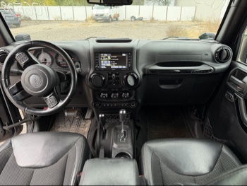 2016 jeep wrangler unlimited-sahara-4wd with 91724 miles for sale near Elk River, Minnesota 106578_34_whole_dash.jpg