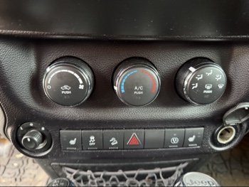 2016 jeep wrangler unlimited-sahara-4wd with 91724 miles for sale near Elk River, Minnesota 106578_40_climate_control.jpg
