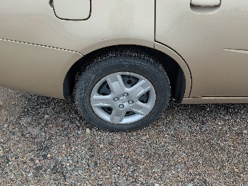 2006 saturn ion with 93338 miles for sale near Elk River, Minnesota 106579_14_rear_pass_wheel.jpg