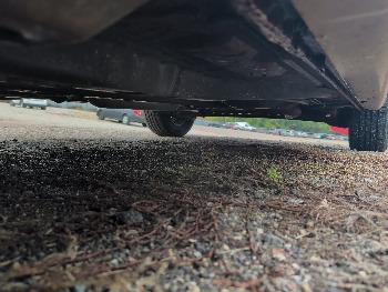 2006 saturn ion with 93338 miles for sale near Elk River, Minnesota 106579_17_undercar_drv_side.jpg