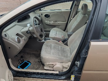 2006 saturn ion with 93338 miles for sale near Elk River, Minnesota 106579_22_driver_seat.jpg