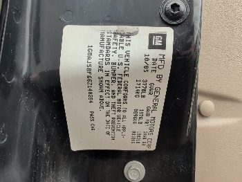 2006 saturn ion with 93338 miles for sale near Elk River, Minnesota 106579_47_door_vin_sticker.jpg