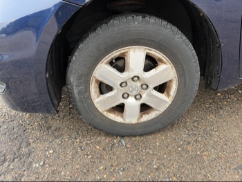 2006 toyota sienna le-7-passenger with 96729 miles for sale near Elk River, Minnesota 106581_12_drv_front_wheel.jpg