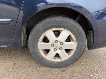 2006 toyota sienna le-7-passenger with 96729 miles for sale near Elk River, Minnesota 106581_13_rear_drv_wheel.jpg