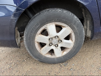 2006 toyota sienna le-7-passenger with 96729 miles for sale near Elk River, Minnesota 106581_14_rear_pass_wheel.jpg