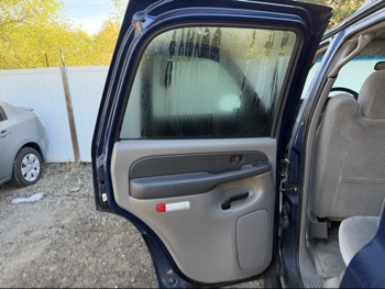 2003 chevrolet tahoe 4wd with 168168 miles for sale near Elk River, Minnesota 106589_25_drv_rear_door_panel.jpg