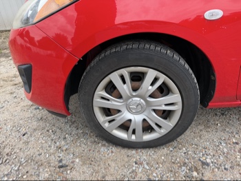 2013 mazda mazda2 sport with 211727 miles for sale near Elk River, Minnesota 106595_12_drv_front_wheel.jpg