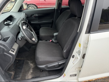 2010 scion xb 5-door-wagon-5-spd-mt with 219543 miles for sale near Elk River, Minnesota 106606_22_driver_seat.jpg