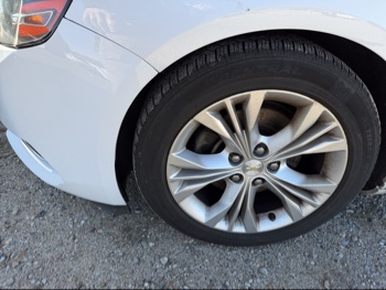 2014 chevrolet impala 1lt with 148521 miles for sale near Elk River, Minnesota 106609_12_drv_front_wheel.jpg