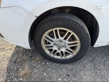 2008 ford focus ses-sedan with 288350 miles for sale near Elk River, Minnesota 106610_12_drv_front_wheel.jpg