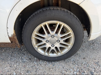 2008 ford focus ses-sedan with 288350 miles for sale near Elk River, Minnesota 106610_13_rear_drv_wheel.jpg